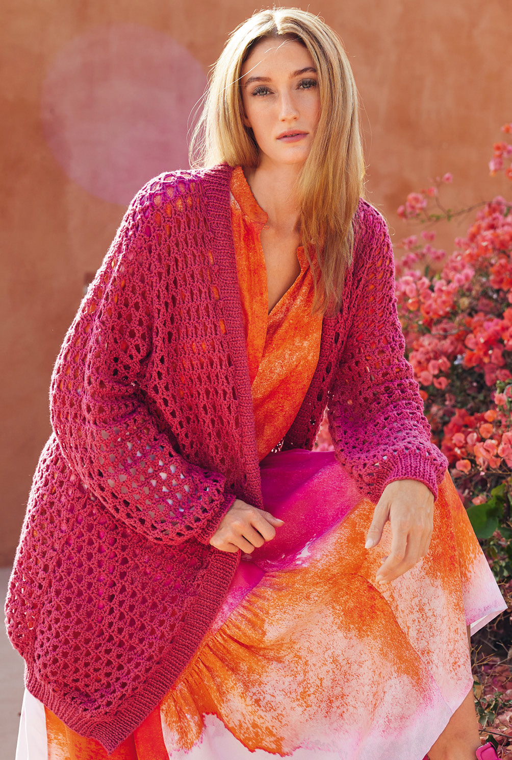 Modellansicht Bild 2: Longjacke in Netzmuster-Optik