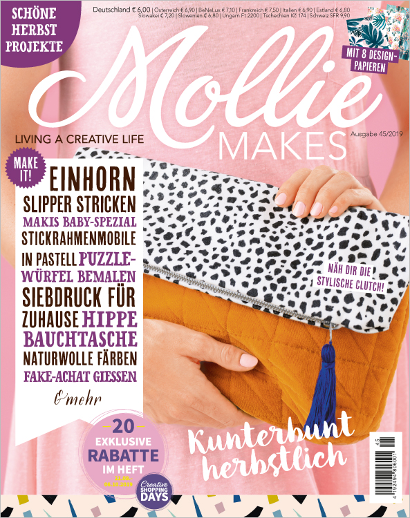 Moderne Clutch mit schwarzem Leopardenmuster, DIY-Textur, blauer Quaste, perfekt für kreative Projekte.