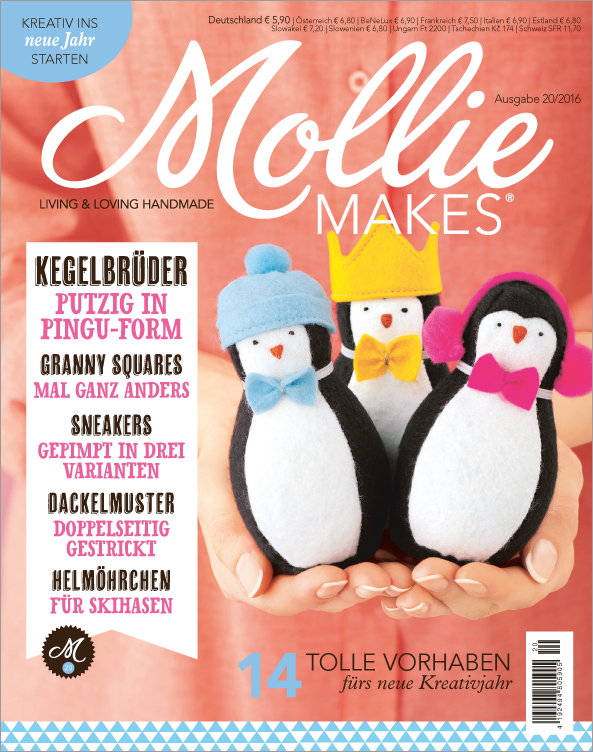 Niedliche, handgemachte Pinguine mit bunten Hüten; modisch, kreativ, DIY.