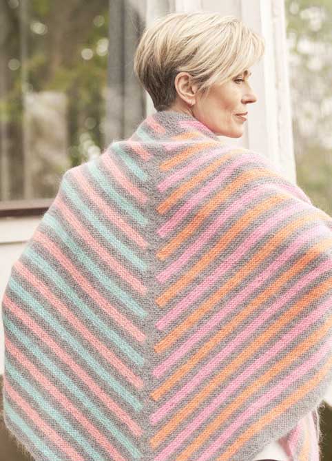 Pastellfarbiges, gestricktes Streifenmuster, modisch handgemacht. Schlicht, DIY-Charme, weiches Material.