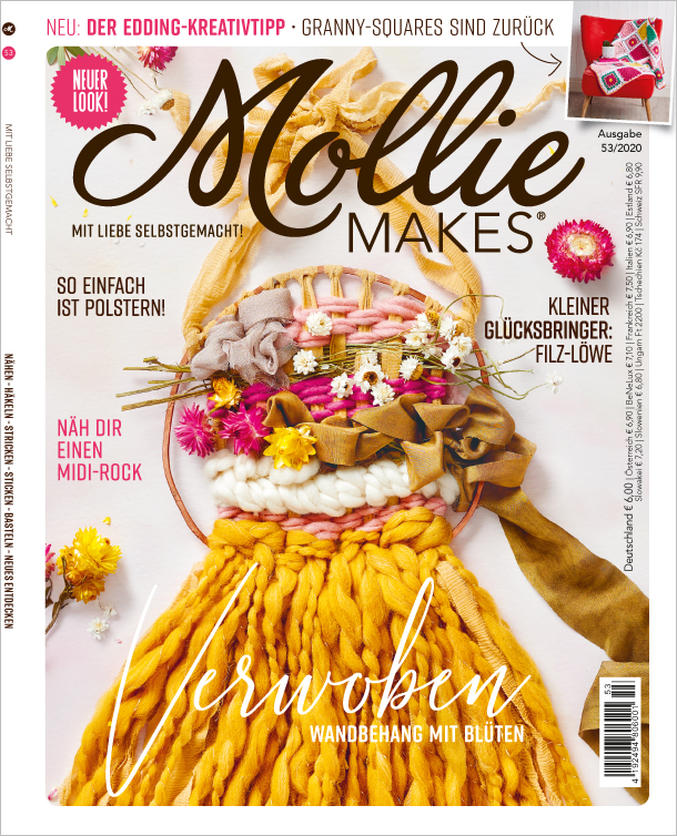 Bunte Wollmuster, handgefertigte Blumen, modisch verwoben mit warmen Gelb- und Rosatönen. DIY-Charme.