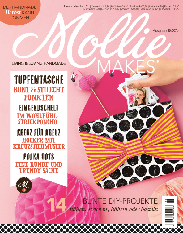 Schwarz-weiße Punkte, gelb-pinkes Streifenmuster, trendiges DIY-Accessoire, handgemacht, kreativ.