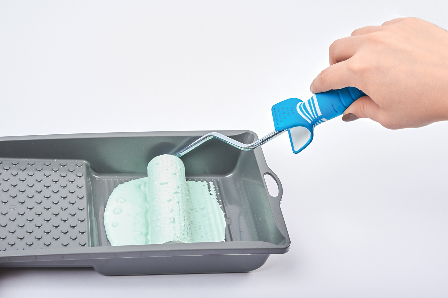 Blau-Grün, kreativer Farbroller, handgemacht, ergonomisch, ideal für Heimwerker und künstlerisches Gestalten.