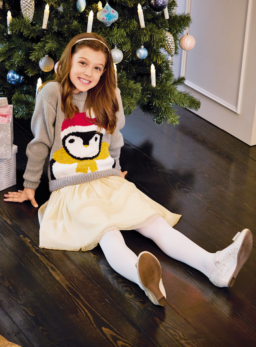 Für kleine Tierfreunde ist der Kinderpulli mit Pinguin unerlässlich!