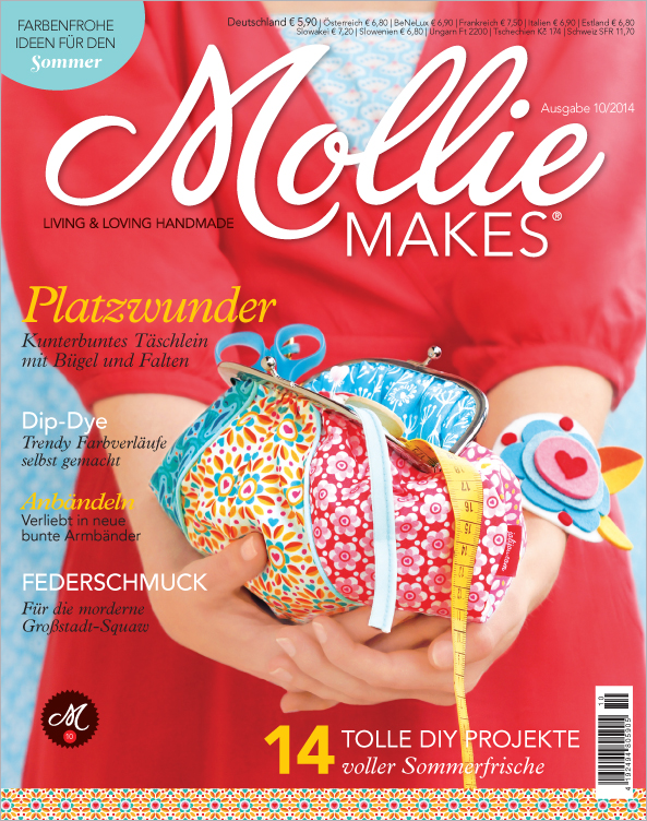 Farbenfrohe, selbstgemachte Täschchen mit floralen Mustern; DIY-Accessoires in lebendigen Farben.