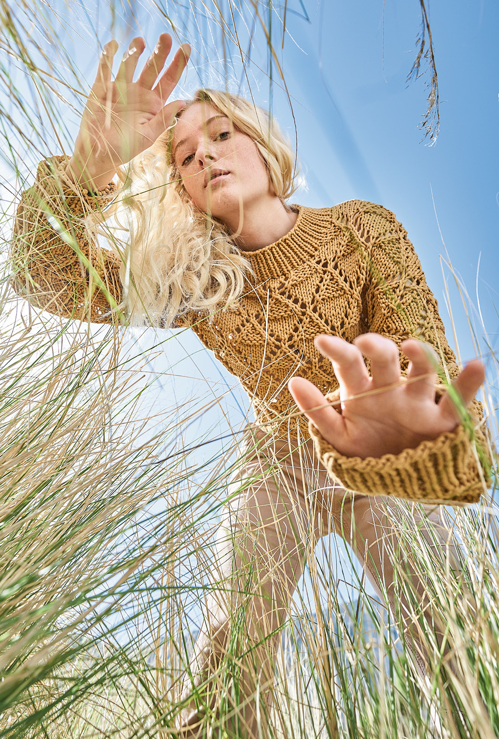 Modellansicht Bild 2: Pulli im Ajour-Rautenmuster