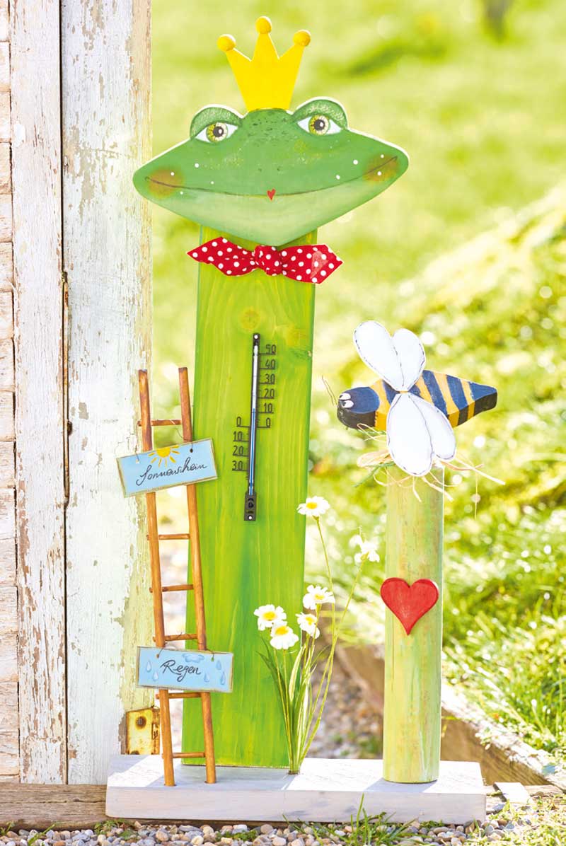 Handgemachtes Design: Froschkrone, rote Fliege, bunte Biene, Herzdetail. DIY-Deko mit charmanten Akzenten.