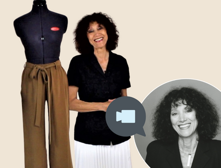 Braune, handgemachte Hose mit Gürtel, kombiniert mit schwarzem, schlichtem Oberteil. Modisch und elegant.