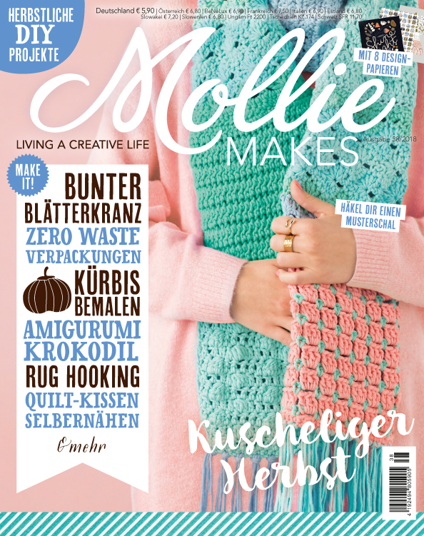 Strickschal in Türkis und Rosa, handgefertigt, modernes Design. Perfekt für DIY-Enthusiasten.