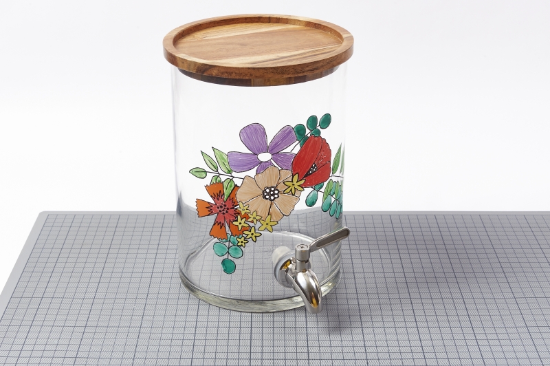 Glas-Dispenser mit buntem Blumenmuster, Holzdeckel, DIY-Charme, ideal für modische Präsentationen.