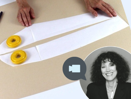 Papierausschnitt mit gelben Gewichten; Modisch, handgemacht, klarer Schnitt, präzise Umsetzung.