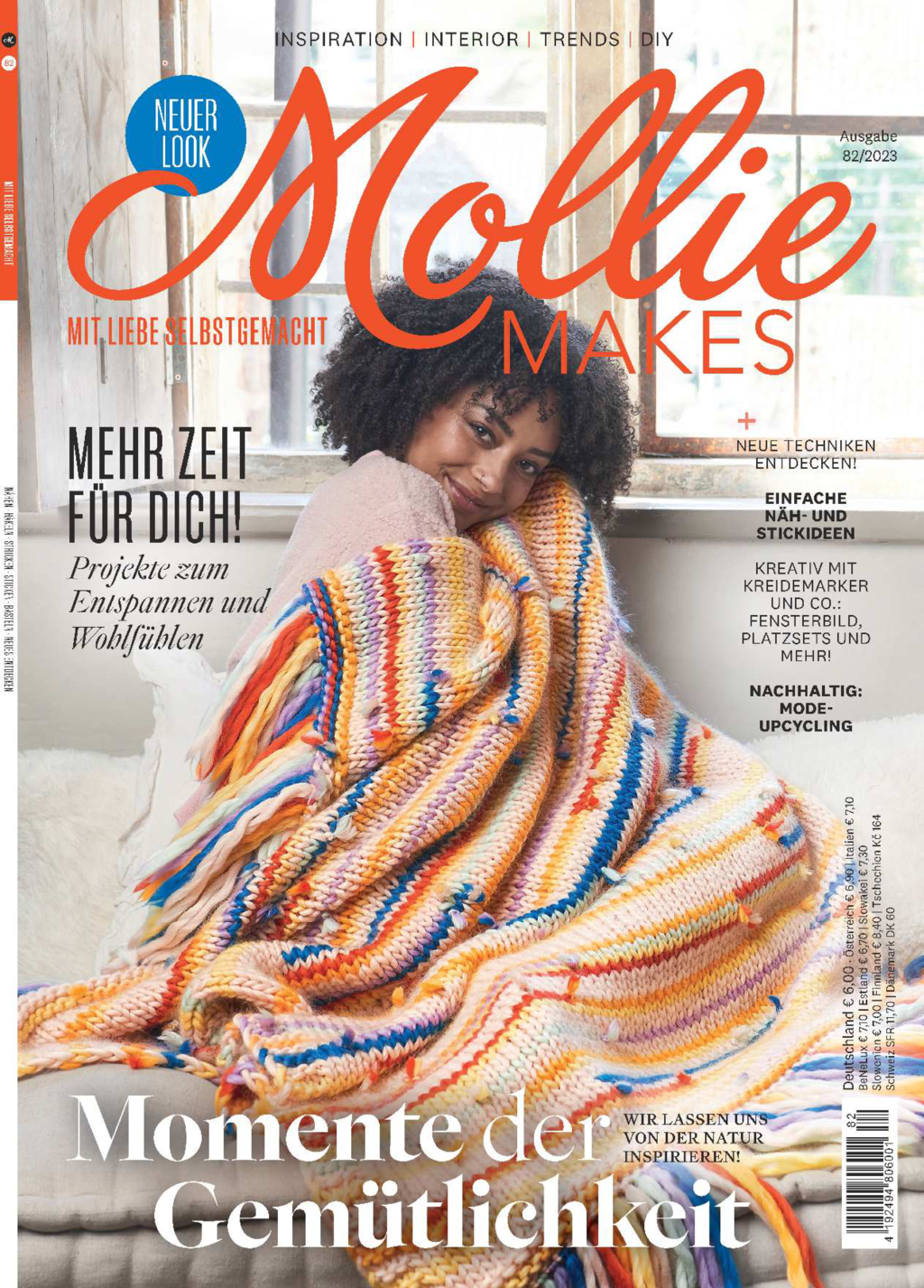 Modische, handgemachte Decke in bunten Streifen. DIY-Chic, perfektes Accessoire für Gemütlichkeit.