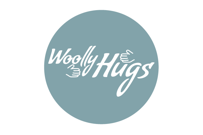 Markenlogo grau Woolly Hugs Maschenwelt