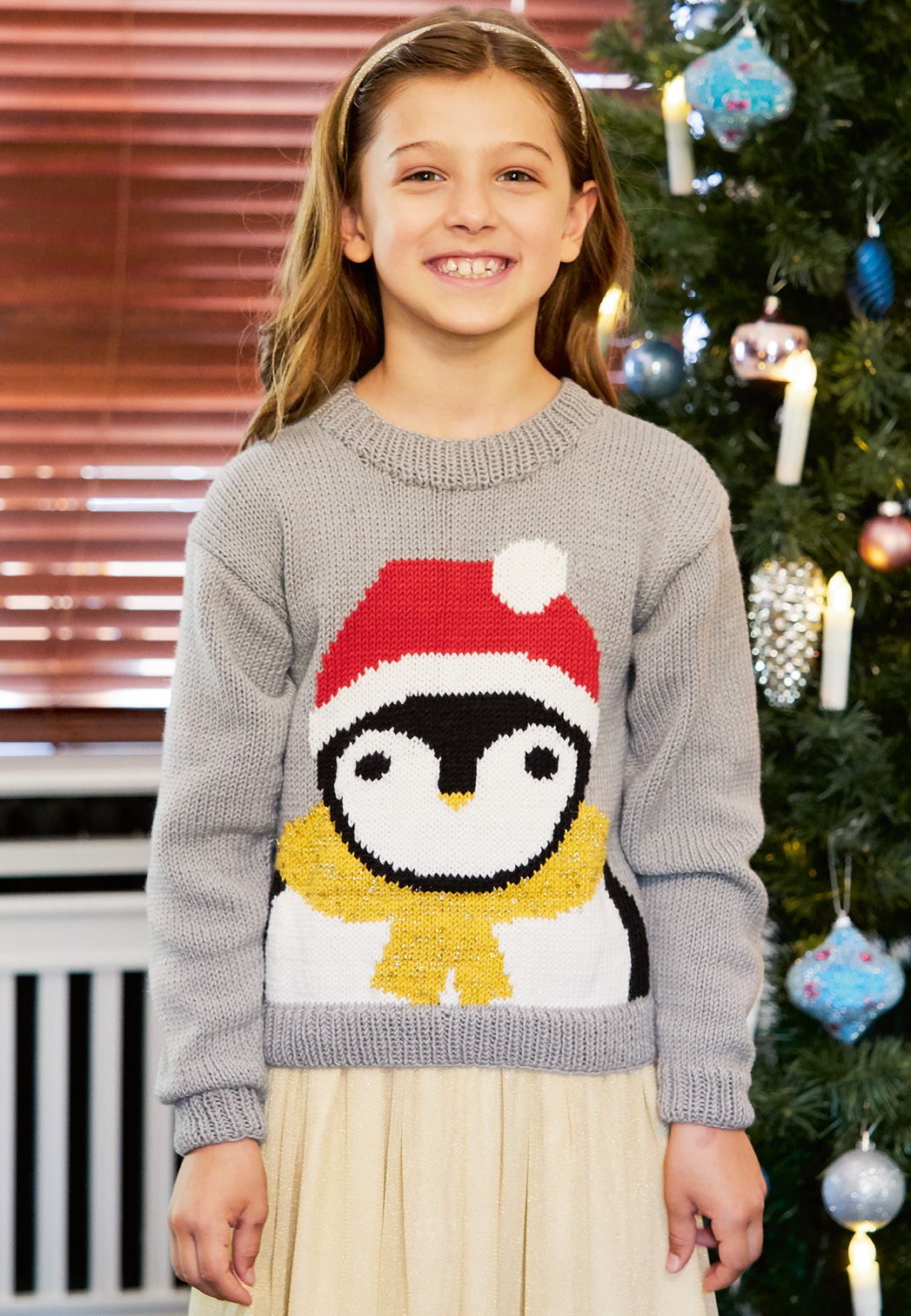 Für kleine Tierfreunde ist der Kinderpulli mit Pinguin unerlässlich!